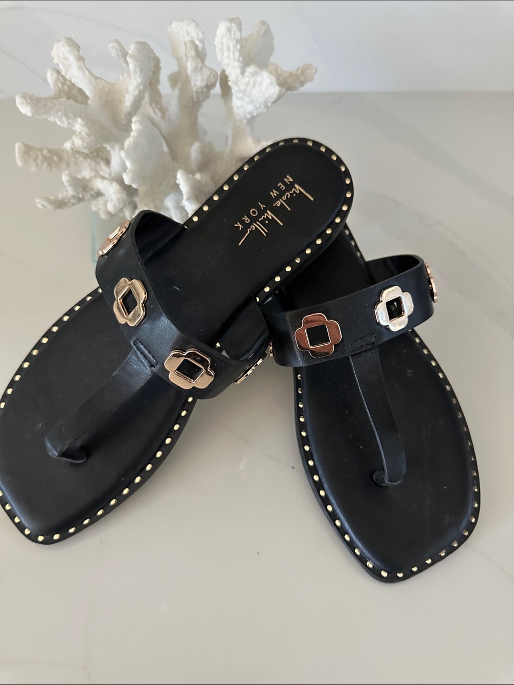 Nicole Miller NEW YORK Black Thong Sandals with Gold Accents. Size 8.